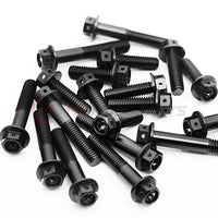 Black CNC Race Spec Crankcase Cover Bolts for Triumph Tiger Sport 660, M6 size, by MC Motoparts, shown on engine part.