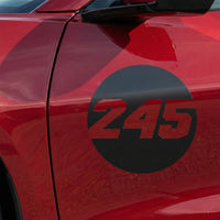 Pair of black hollow racing numbers decals with cut-out font for race car customization, designed by MC Motoparts.
