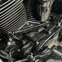 Carbon fiber adjustable Harley shifter linkage for Touring and Softail models, CNC billet aluminum with no-slop shifting.