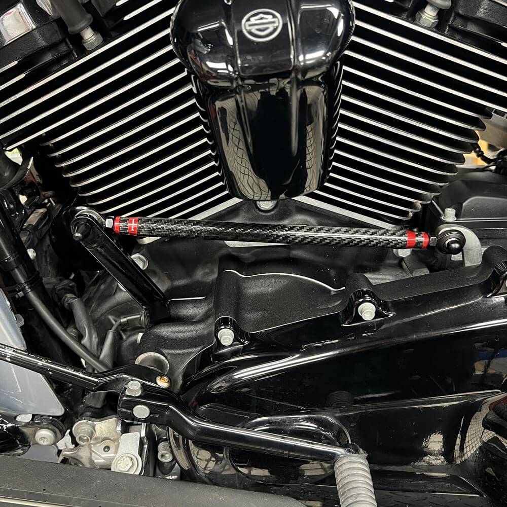 Carbon fiber adjustable Harley touring shifter linkage by Pazoma, CNC billet aluminum, for Harley Street Glide and Road Glide models 1986-2026.