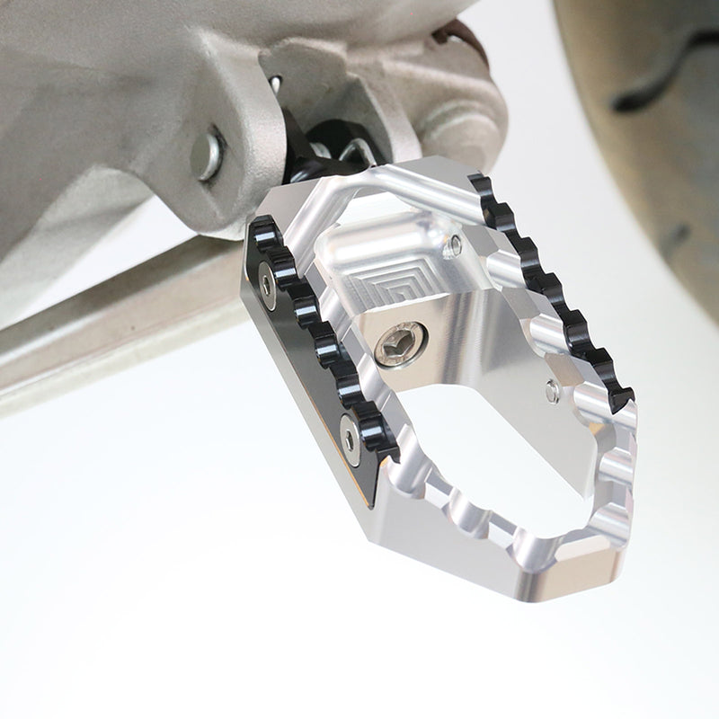 {Front}  Fits Tuono 125 660 1000 V4R TRC Touring Wide Foot Pegs - MC Motoparts