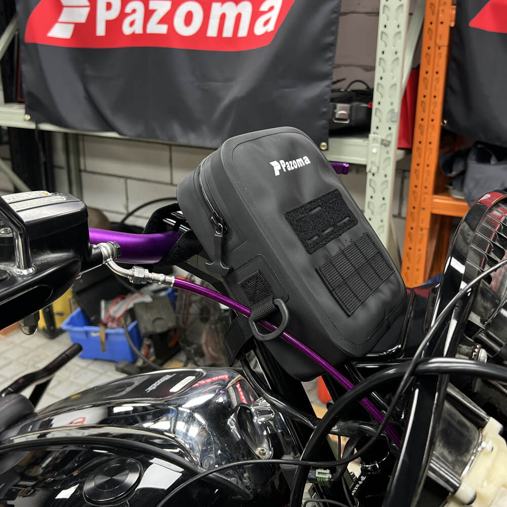 Pazoma waterproof motorcycle handlebar bag with tactical design for Harley Softail, Dyna, and Sportster bikes.
