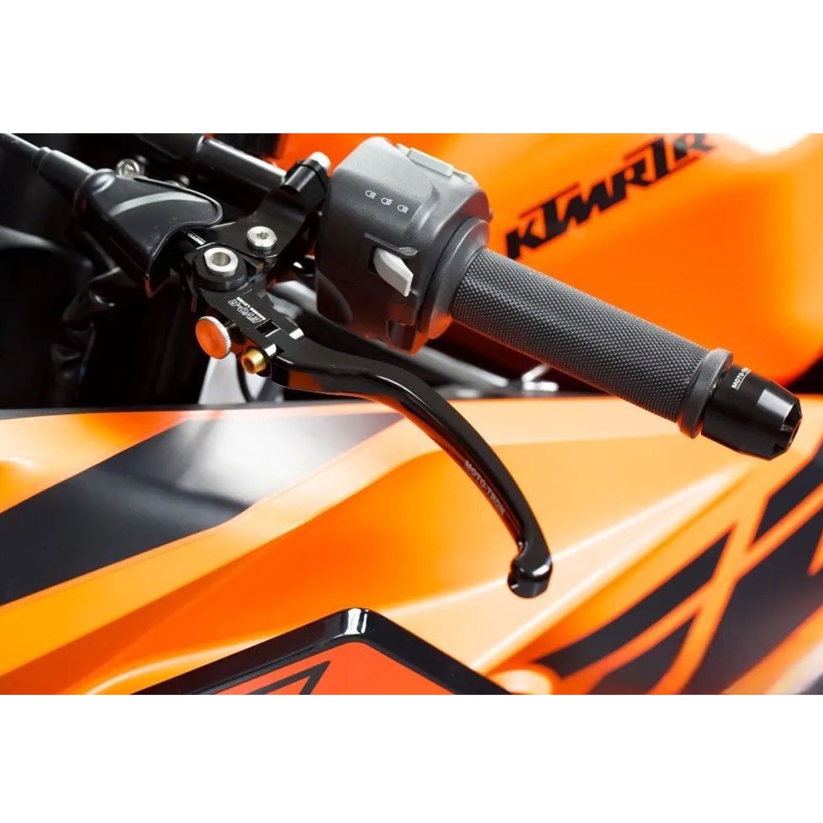 Moto-Tron lightweight racing clutch lever installed on Ducati Monster 797, 821 Hypermotard motorcycle, showcasing sleek design and craftsmanship.